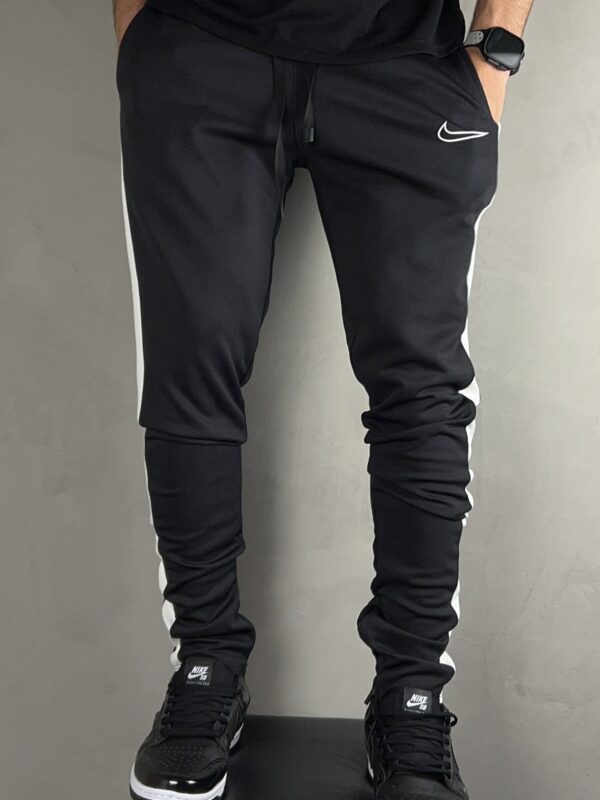 Calça TRAKSUIT